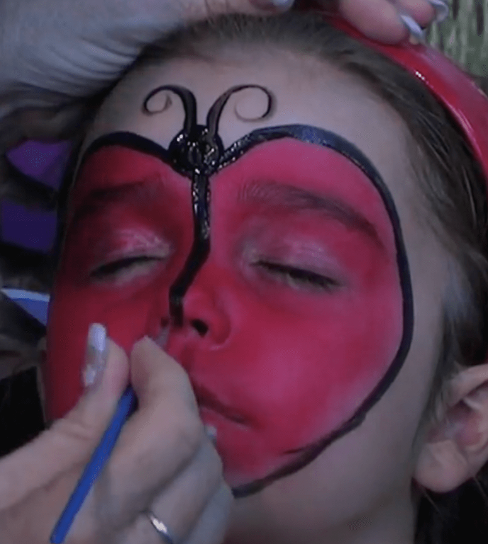 Face paint design Ladybug Step 4